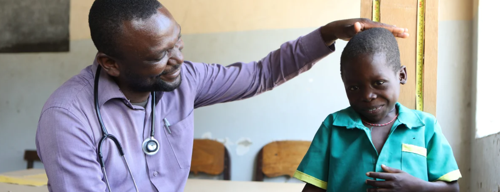 Man with child in Malawi